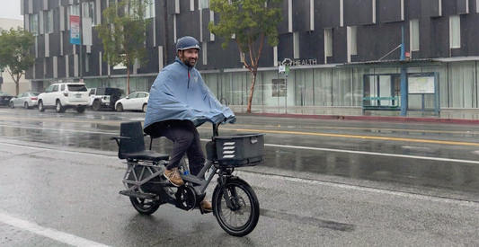 wombi e-bike rider in the rain